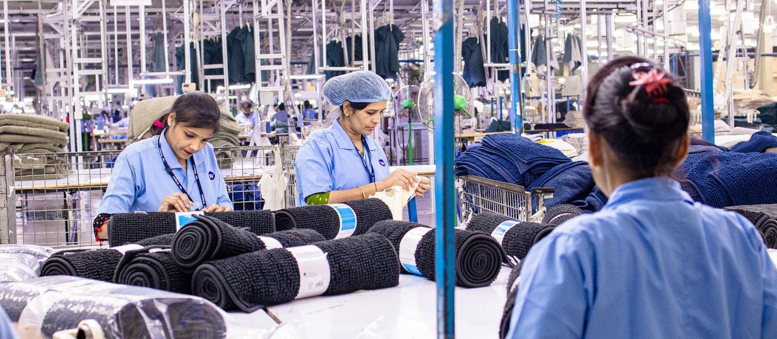 Wide view of the main production hall with stitching lines